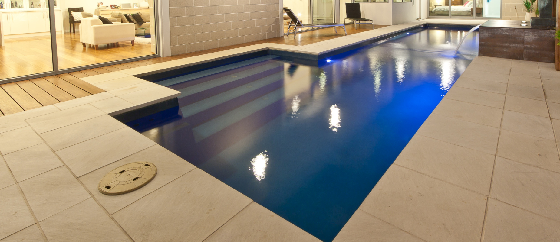 Compass-Pools-Australia_Fastlane-swimming-pool-with-water-feature