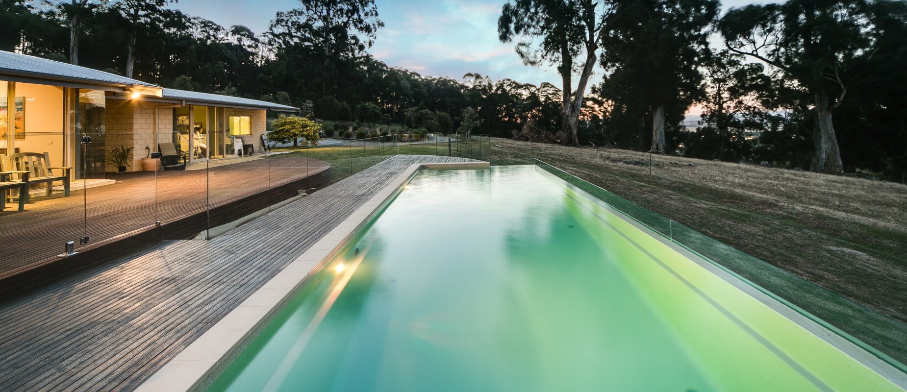 Compass-Pools-Australia_X-Trainer-11.8m-fibreglass-pool-with-Maxi-Glass-Edge-in-Trafalgar-in-Beach-colour